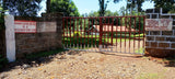Entrance gate to Thiriku Coffee Factory in Nyeri, Kenya