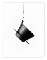 OREA 01 Obsidian coated steel brewer hanging from a hook on a white background
